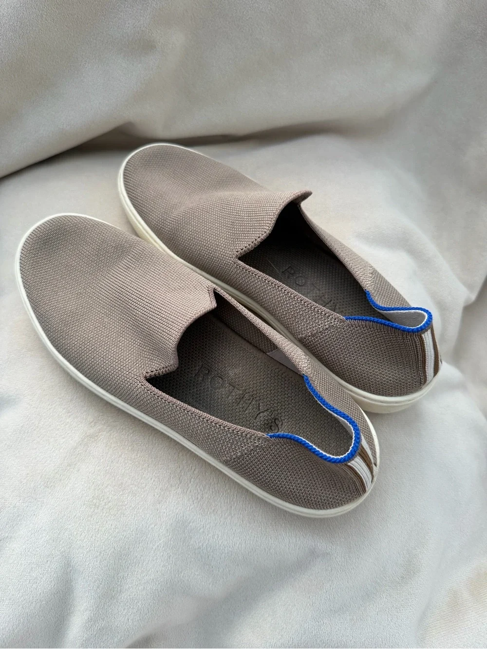 Rothy's Slip-On Knit Sneakers in Taupe with Blue Trim